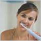 how to brush teeth using electric toothbrush
