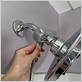 attach hose to shower head