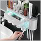automatic toothpaste dispenser with toothbrush holder