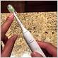 brushing with sonicare toothbrush