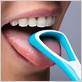 brushing your tongue with a toothbrush