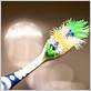 can using a hard toothbrushes damage gums