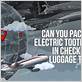 can you pack an electric toothbrush in checked luggage tui