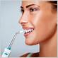 can you use water flosser with invisalign buttons