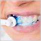 cleaning front teeth with electric toothbrush