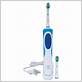 electric toothbrush with flossing action