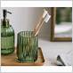 green glass toothbrush holder