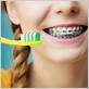 how do u brush teeth with braces