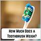 how much does a toothbrush weigh in ounces