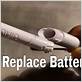 how to change a quip toothbrush battery