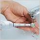 how to clean electric toothbrush handle