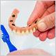 how to clean permanent implant dentures