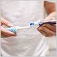 how to put toothpaste on electric toothbrush