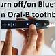 how to turn on oral b toothbrush