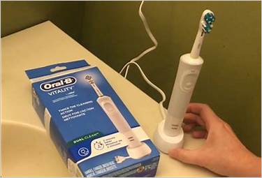 how to use timer on oral b toothbrush