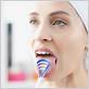 is it ok to brush your tongue with a toothbrush