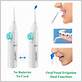 manual travel oral irrigator