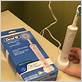 oral b electric toothbrush how to know it's charging