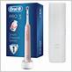oral b pink electric toothbrush with travel case