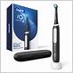oral-b io series electric toothbrush with brush stores