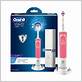 pink electric toothbrush with travel case