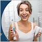 proper way to use sonicare toothbrush