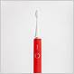 red electric toothbrush