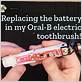 remove battery oral b toothbrush