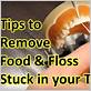 removing stuck dental floss