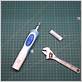 replacing battery in oral b electric toothbrush