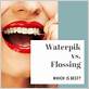 should i floss before or after waterpik