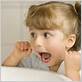 toddler eats dental floss