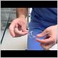 tying a knot around a wart with dental floss