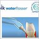 using a water flosser with gum disease