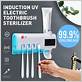 uv light toothbrush holder and toothpaste dispenser