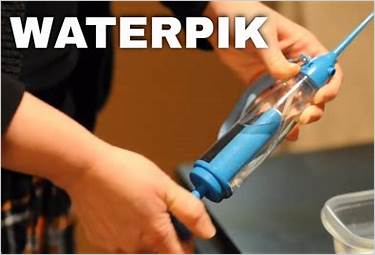 waterpik handheld pump action