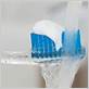 wet toothbrush before toothpaste
