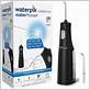 where is the battery located in a waterpik water flosser