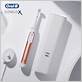 white and rose gold electric toothbrush