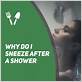 why do i sneeze after showering