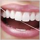 wrap dental floss tape around painful tooth